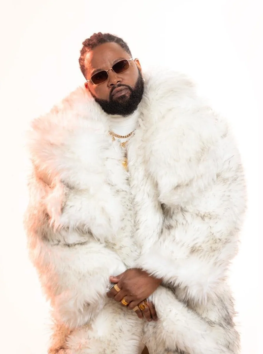 Ferre Gola in a white coat