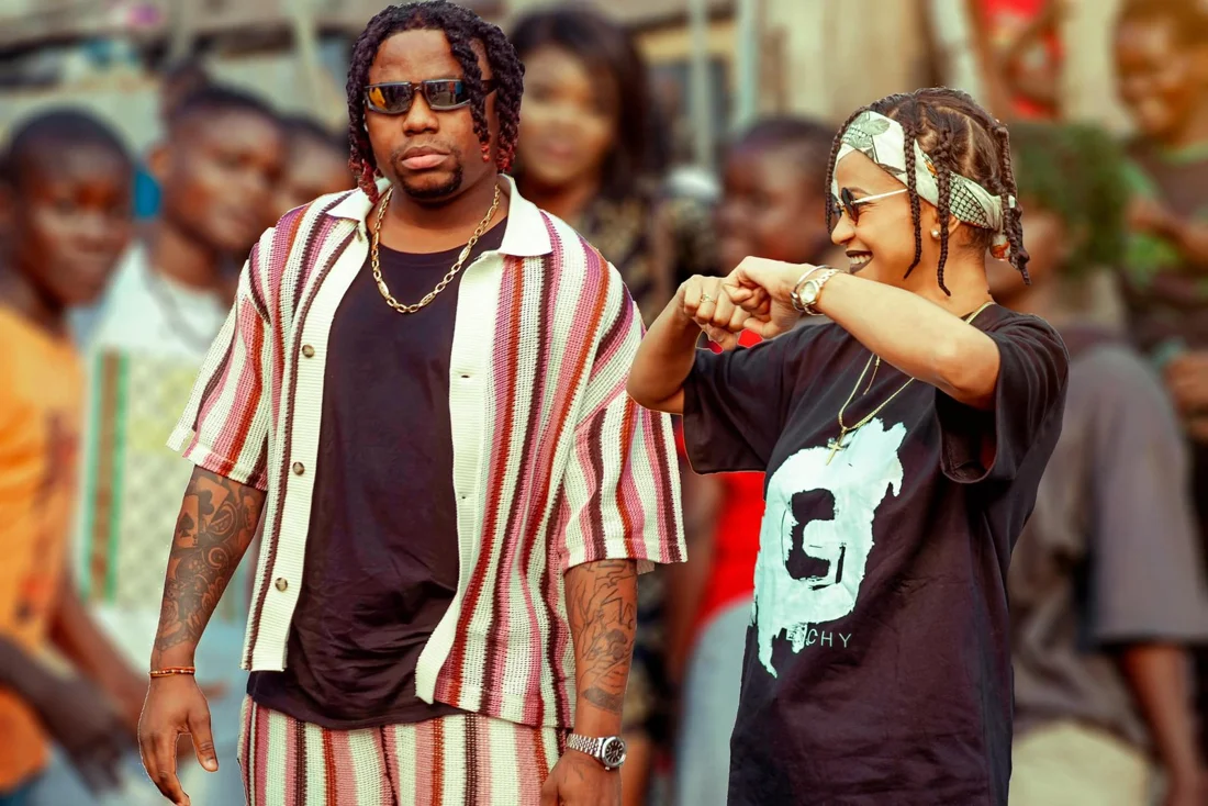 Artists performing together outdoors